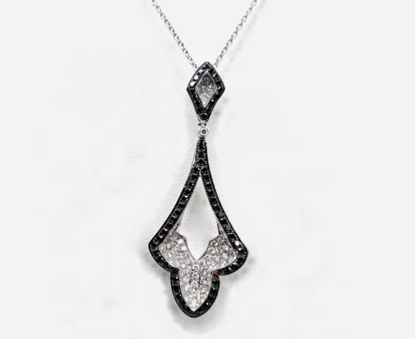 18 Karat White Gold Round Brilliant Diamond and Black Diamond Pendant with Chain